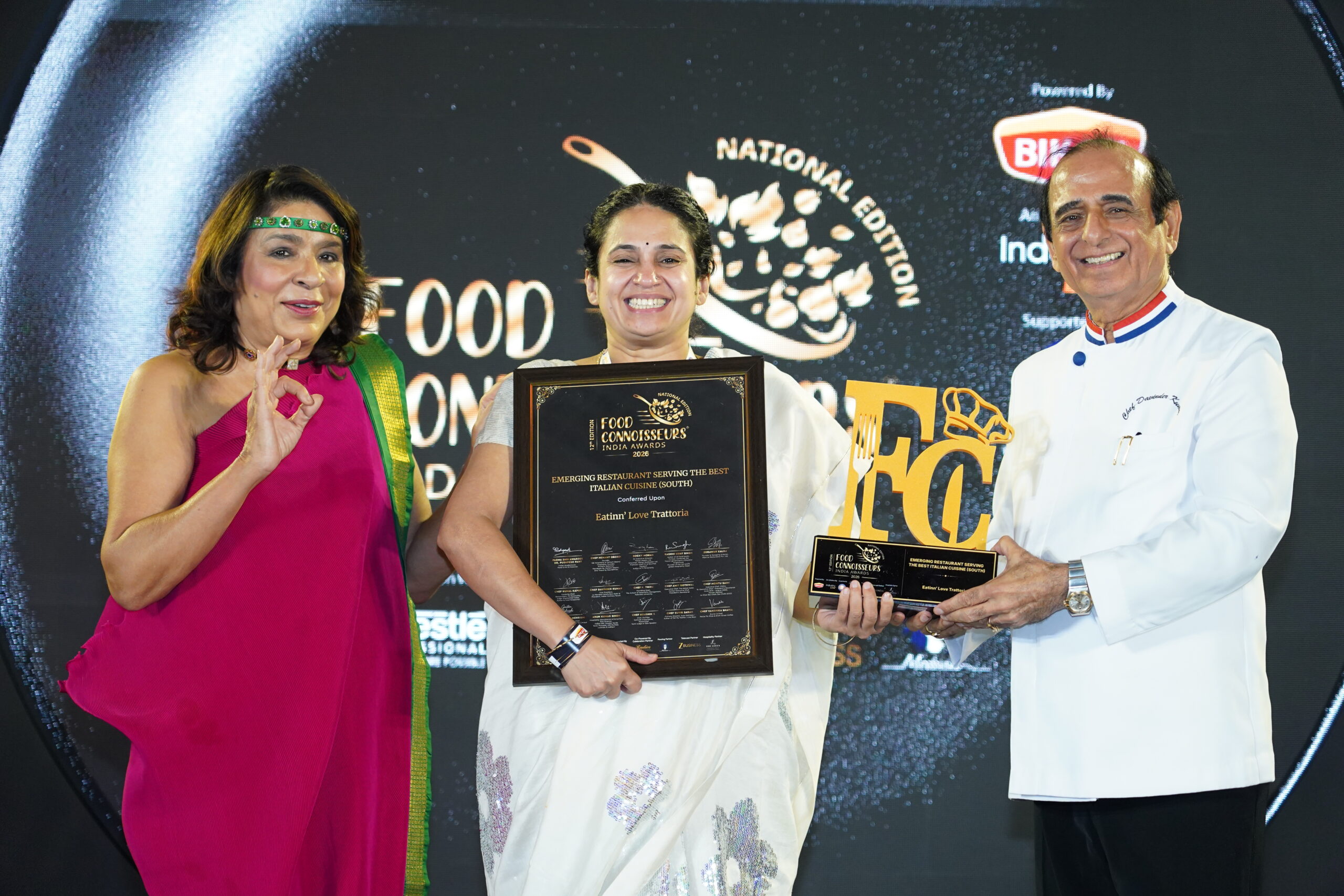 Niharika Peri receiving the Emerging Restaurant serving the best Italian Cuisine (South) award at Food Connoisseurs India Convention 2026